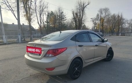 Hyundai Solaris II рестайлинг, 2011 год, 695 000 рублей, 13 фотография