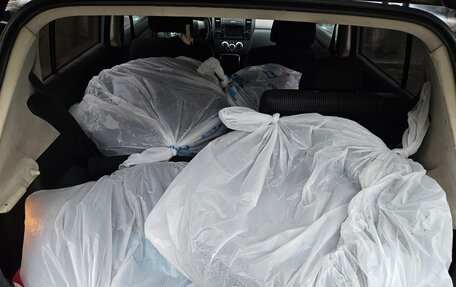 Nissan Tiida, 2010 год, 820 000 рублей, 8 фотография