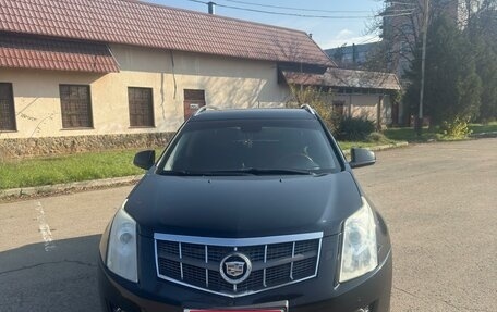 Cadillac SRX II рестайлинг, 2011 год, 1 300 000 рублей, 1 фотография