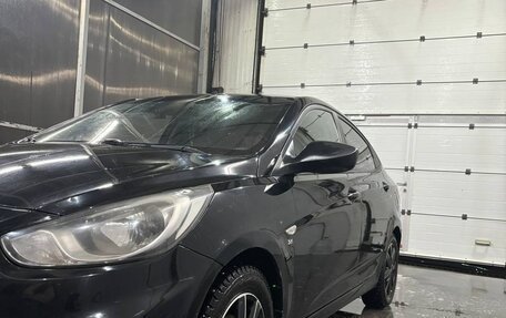 Hyundai Solaris II рестайлинг, 2011 год, 700 000 рублей, 14 фотография