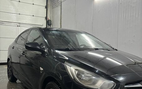 Hyundai Solaris II рестайлинг, 2011 год, 700 000 рублей, 16 фотография