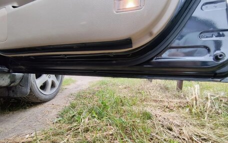 Toyota Avensis III рестайлинг, 2004 год, 650 000 рублей, 11 фотография