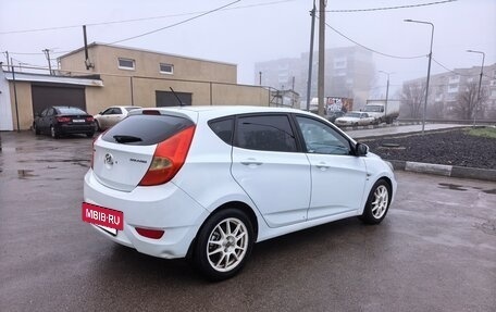 Hyundai Solaris II рестайлинг, 2011 год, 690 000 рублей, 2 фотография