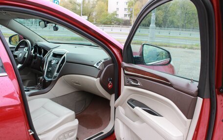 Cadillac SRX II рестайлинг, 2012 год, 1 390 000 рублей, 18 фотография