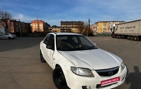 Mazda Familia, 2002 год, 210 000 рублей, 1 фотография