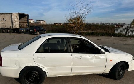 Mazda Familia, 2002 год, 210 000 рублей, 6 фотография