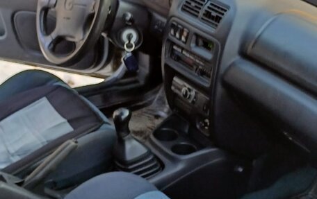 Mazda 323, 1998 год, 180 000 рублей, 7 фотография