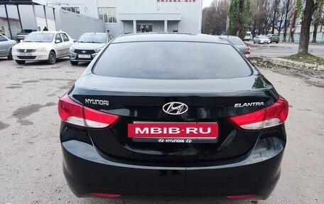 Hyundai Elantra V, 2013 год, 900 000 рублей, 4 фотография