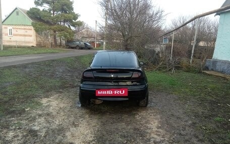 Opel Tigra, 1997 год, 270 000 рублей, 13 фотография