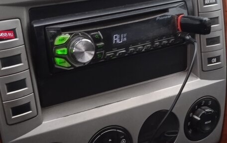 KIA Carnival III, 2005 год, 600 000 рублей, 8 фотография