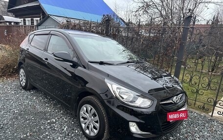 Hyundai Solaris II рестайлинг, 2011 год, 570 000 рублей, 13 фотография