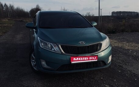 KIA Rio III рестайлинг, 2012 год, 590 000 рублей, 1 фотография