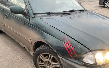 Toyota Avensis III рестайлинг, 1998 год, 130 000 рублей, 2 фотография