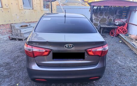 KIA Rio III рестайлинг, 2014 год, 910 000 рублей, 11 фотография