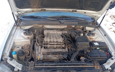 KIA Magentis I, 2004 год, 400 000 рублей, 12 фотография