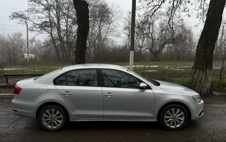 Volkswagen Jetta VI, 2011 год, 848 000 рублей, 3 фотография