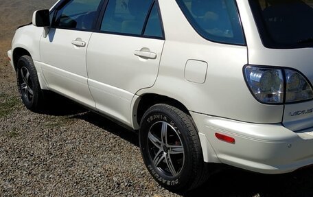 Lexus RX IV рестайлинг, 2000 год, 980 000 рублей, 2 фотография