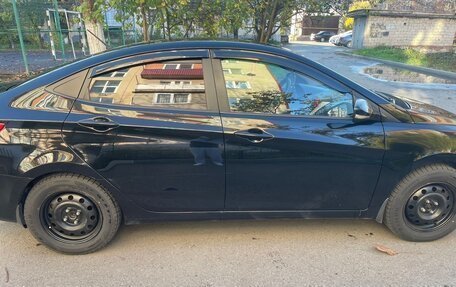 Hyundai Solaris II рестайлинг, 2011 год, 660 000 рублей, 1 фотография