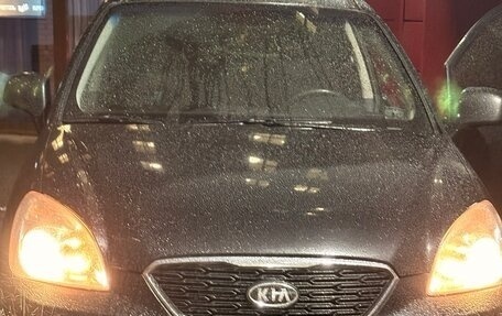 KIA Carens III (RP), 2011 год, 750 000 рублей, 10 фотография