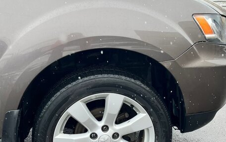 Mitsubishi Outlander III рестайлинг 3, 2011 год, 1 650 000 рублей, 10 фотография