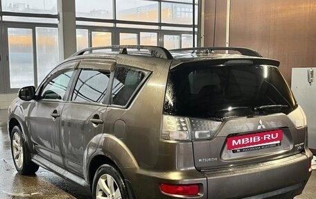 Mitsubishi Outlander III рестайлинг 3, 2011 год, 1 650 000 рублей, 13 фотография