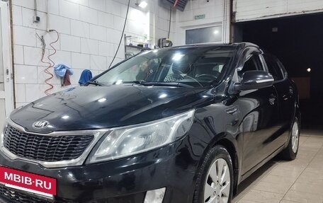 KIA Rio III рестайлинг, 2013 год, 700 000 рублей, 3 фотография