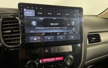 Mitsubishi Outlander III рестайлинг 3, 2013 год, 1 340 000 рублей, 19 фотография