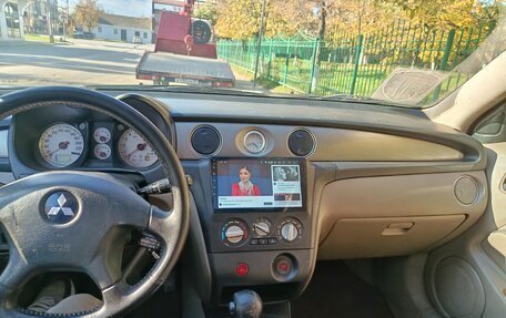 Mitsubishi Outlander III рестайлинг 3, 2004 год, 400 000 рублей, 15 фотография