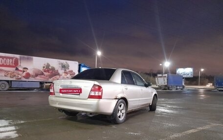 Mazda 323, 2003 год, 245 000 рублей, 10 фотография