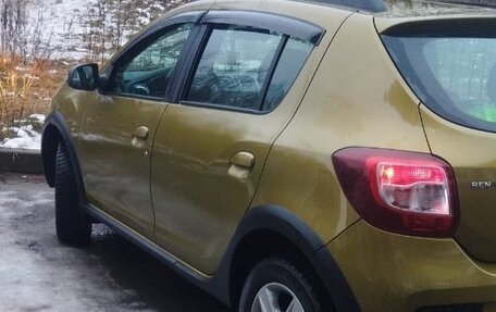 Renault Sandero II рестайлинг, 2014 год, 880 000 рублей, 21 фотография