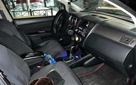 Nissan Tiida, 2010 год, 700 000 рублей, 8 фотография