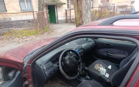 Ford Escort V, 1997 год, 110 000 рублей, 12 фотография