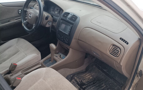 Mazda Protege, 1999 год, 155 000 рублей, 6 фотография