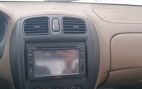 Mazda Protege, 1999 год, 155 000 рублей, 9 фотография