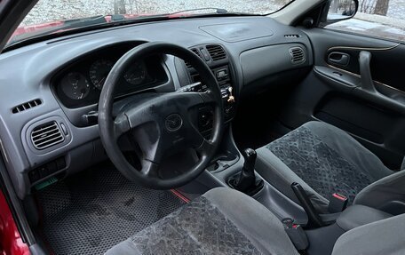 Mazda 323, 1998 год, 199 000 рублей, 11 фотография