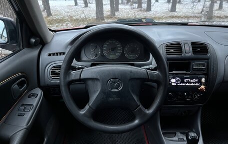 Mazda 323, 1998 год, 199 000 рублей, 17 фотография