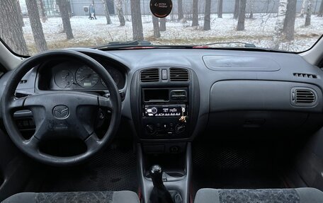 Mazda 323, 1998 год, 199 000 рублей, 15 фотография