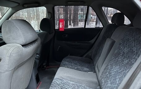 Mazda 323, 1998 год, 199 000 рублей, 12 фотография