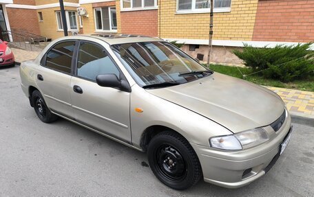 Mazda 323, 1998 год, 210 000 рублей, 3 фотография