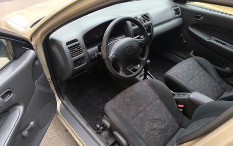 Mazda 323, 1998 год, 210 000 рублей, 8 фотография