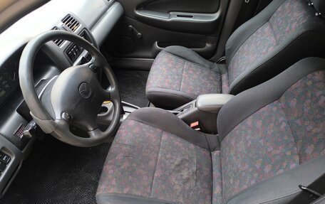 Mazda 323, 1998 год, 210 000 рублей, 11 фотография