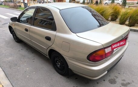 Mazda 323, 1998 год, 210 000 рублей, 6 фотография