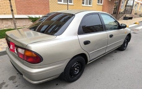 Mazda 323, 1998 год, 210 000 рублей, 4 фотография