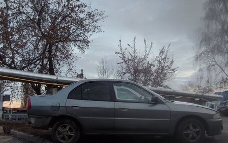 Mitsubishi Lancer VII, 1996 год, 83 000 рублей, 7 фотография