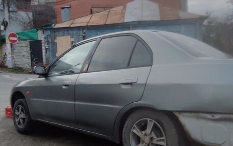 Mitsubishi Lancer VII, 1996 год, 83 000 рублей, 5 фотография