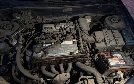 Mitsubishi Mirage VI рестайлинг, 2000 год, 190 000 рублей, 14 фотография