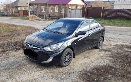 Hyundai Solaris II рестайлинг, 2011 год, 550 000 рублей, 11 фотография