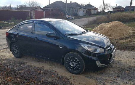 Hyundai Solaris II рестайлинг, 2011 год, 550 000 рублей, 15 фотография