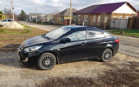 Hyundai Solaris II рестайлинг, 2011 год, 550 000 рублей, 13 фотография