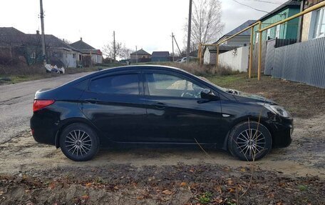 Hyundai Solaris II рестайлинг, 2011 год, 550 000 рублей, 16 фотография